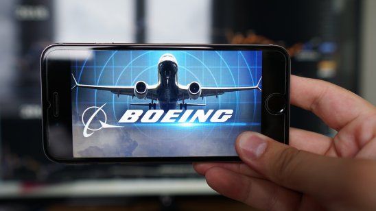 Los Angeles, California, USA - 06 July 2019.Logo of the North American company Boeing is displayed on the screen of the mobile device. Boeing and Brazil's Embraer are commercial partners in the field