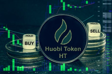 Representation of the huobi token (HT) in front of a trading chart
