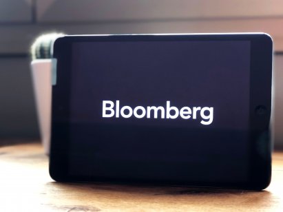 A Bloomberg logo on a smartphone 
