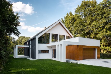 Exterior of modern house in white with a garage 