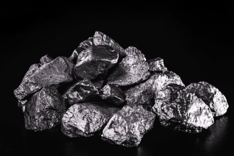 Platinum ore on dark background