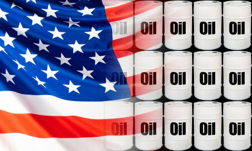White oil barrels on the background of the American flag
