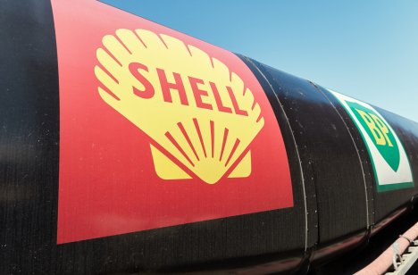 A collection of American vintage retro fuel-transporting trucks with the Shell and BP logos