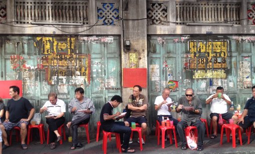 People eating food in the street, Bangkok, Thailand