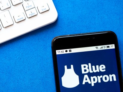 In this photo illustration e-commerce Blue Apron logo is seen displayed on a smartphone