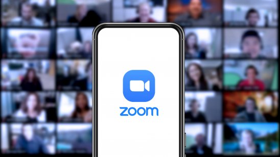 Zoom icon against backdrop of a Zoom call