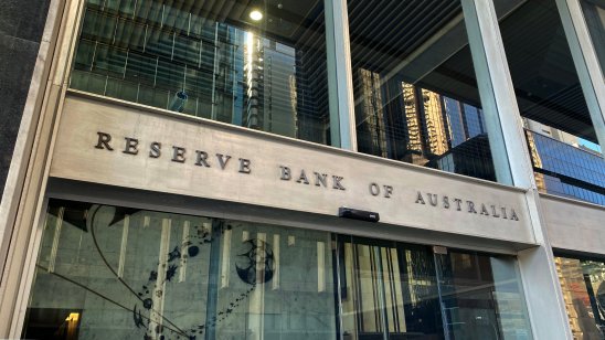 Signage outside the entrance of the Reserve Bank of Australia building in Sydney, Australia.
