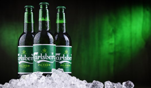 Carlsberg beer stacked on a mound of ice 