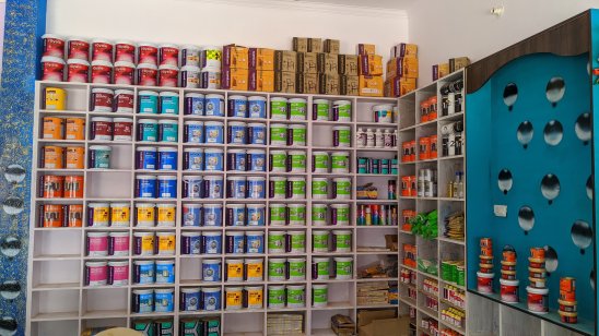 Building supermarket with tins of paint from Asian Paints
