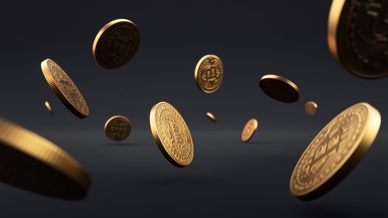 Digital coins falling against black background