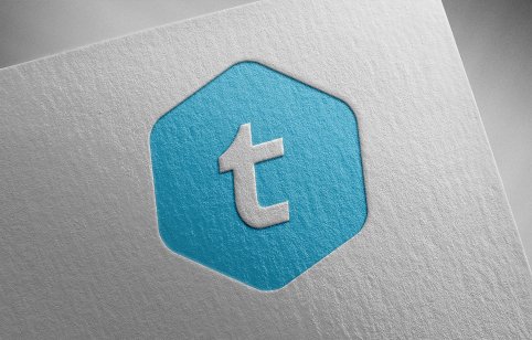 telcoin cryptocurrency icon on paper texture