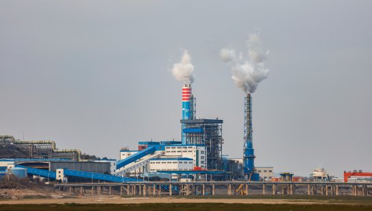 Smokestacks at a chemical plant on the banks of Poyang Lake in China