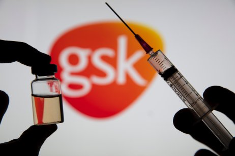 GlaxoSmithKline logo with a Covid vaccine syringe