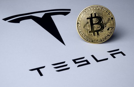 Tesla logo and bitcoin