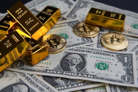 US dollar banknotes, gold and bitcoin