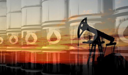 Brent vs WTI: Which crude to trade in 2022? Crude mining concept and graph of falling oil prices on the trading exchange. Crude oil pump jack at oilfield on sunset backround. Fossil crude output and fuels oil production. Oil drill rig