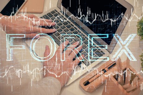 Double exposure of woman hands typing on computer and forex chart hologram drawing. Stock market analysis concept.
