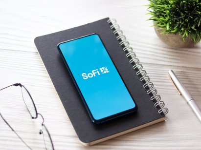 SoFi logo on phone screen stock image.