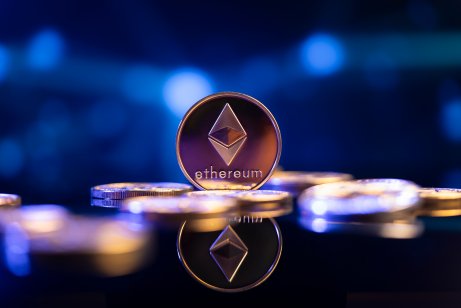 Ethereum cryptocurrency coin, blurred background