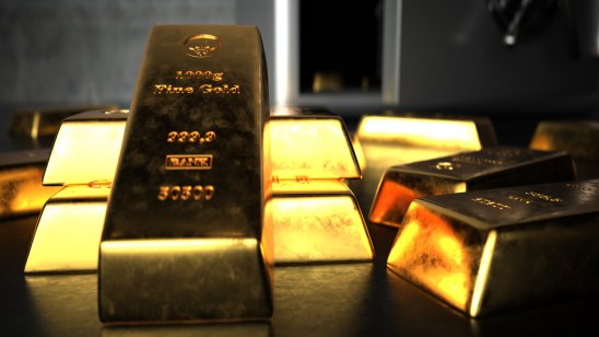 Fine gold bars in front of an open safe.