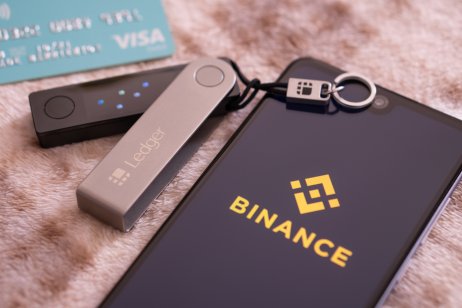 The Binance logo on a smartphone screen