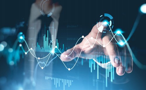 Most stable cryptocurrency: How stablecoins help volatile crypto markets? Office man finger touch finger, virtual screen with stock market changes, business candle chart chart. Double exposure of blue and white lines, growing numbers, online trading