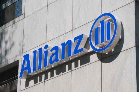 A picture of Allianz company sign hanging on building in Lugano. Allianz is a German multinational financial services company and the largest insurance company in the world