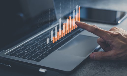 How to see what big investors are buying: Research can help to find best buys Laptop or computer with chart. Investment in business and financial concept of growth and success. Investor data analysis for planning in strategy of stock market fund. Invest f