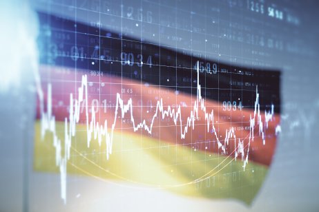 Abstract virtual financial graph hologram on German flag and sunset sky background, financial and trading concept. Multiexposure