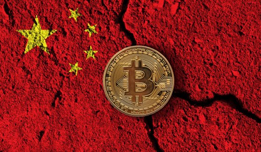 Bitcoin cryptocurrency coin with a cracked China flag