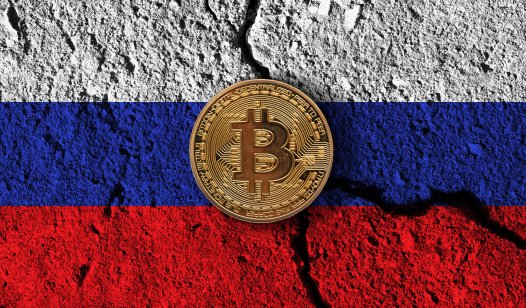 Bitcoin on a cracked Russian flag