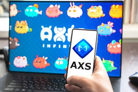 Ethereum crypto game Axie on laptop and mobile phone