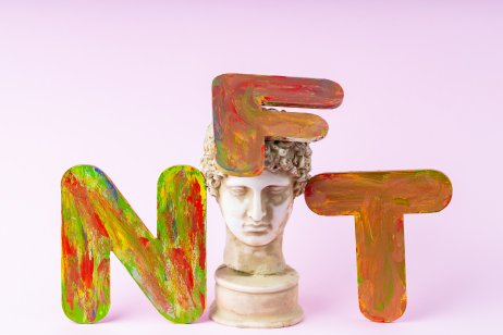 Classical statue and NFT symbol on a pink background