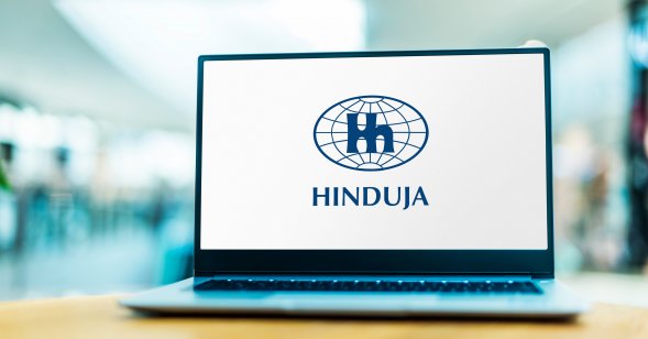 Laptop displaying logo of Hinduja Group
