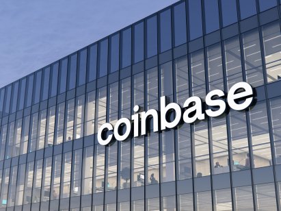 coinbase Signage Logo on Top of Glass Building. 