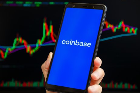 Illustration of Coinbase (COIN) logo on a phone display.