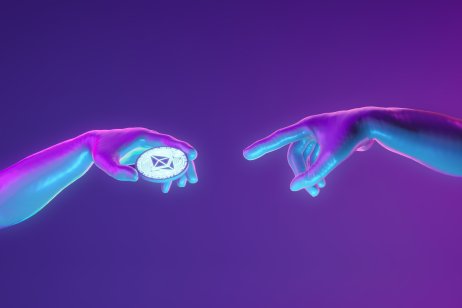 Two hands reaching towards each other with one holding an ether token.