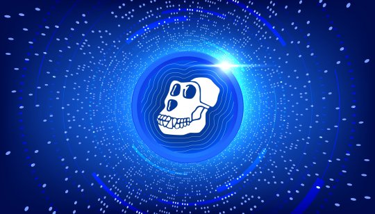 The logo of ApeCoin (APE) which depicts a simian skull within a blue digital-effect circle and halo on a darker blue background