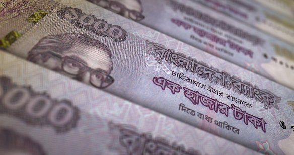 Bangladeshi taka notes in a row