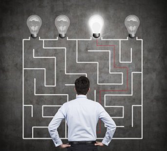 Exit trading strategies: When to exit your trade Confused businessman brainstorming the labyrinth to find the solution