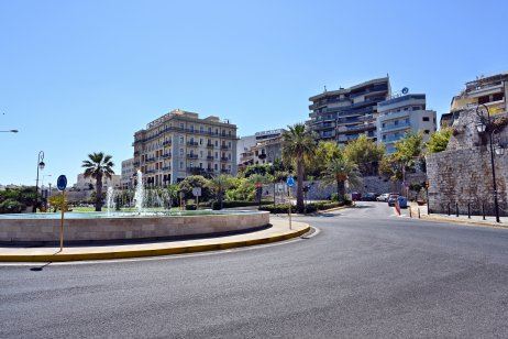Roundabout with traffic signs in the city of Heraklion in Greece near the port. It shows the solution for traffic regulation instead of classic crossroad.