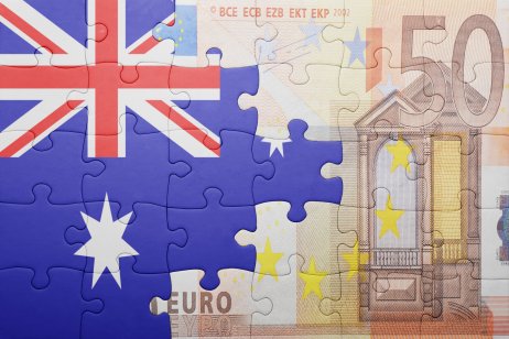 Australian flag and euro note Puzzle pieces showing Australian flag and 50 Euro note