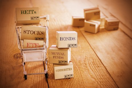 a shopping cart with various financial assets.