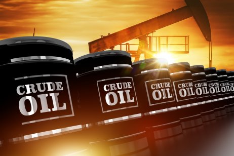 Photo illustration of crude oil in barrels