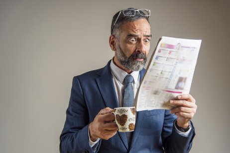 Man shocked at financial news 