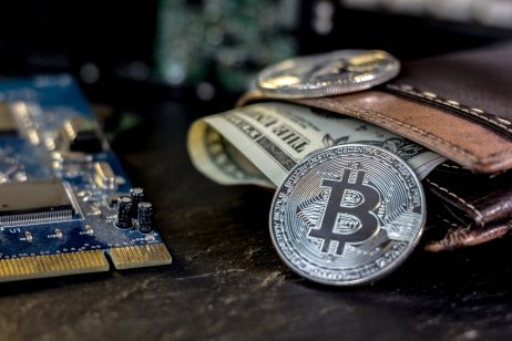 Bitcoin, wallet with money and PCI cards for mining
