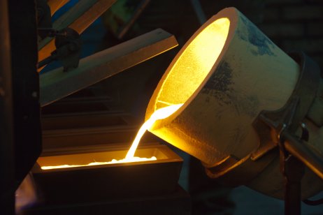 Molten gold being poured into ingot casts
