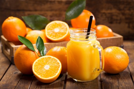 Oranges and orange juice in a glass