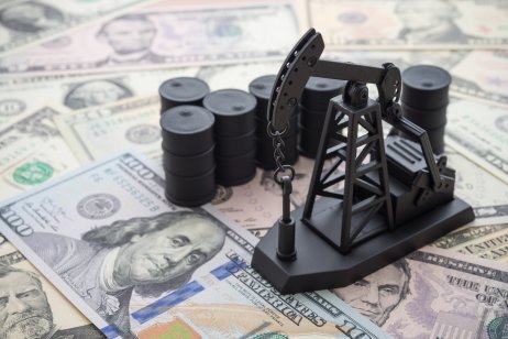 Oil prices Tuesday Oil rig barrel and rig on US currency