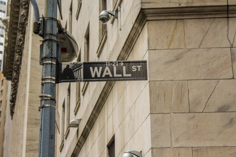 Wall Street signs on a post